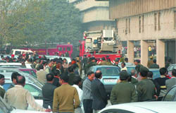 People gathered outside Sena Bhavan in New Delhi on Tuesday.