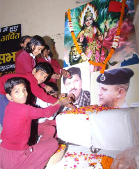 Children pay tributes to martyrs at Gurgaon on Tuesday.