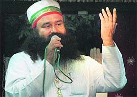 Dera Sacha Sauda chief Gurmeet Ram Rahim Singh addresses his followers