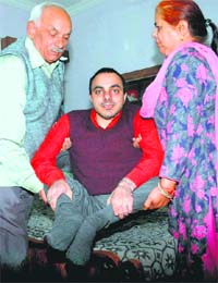 Ganesh along with his parents at his residence in Sector 44