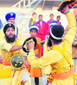 Nihang Sikhs exhibit their skills at the final of the Punjab Inter-school Sports Tournament in Ludhiana