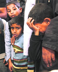 Palestinian boys mourn at the funeral of Ramzi al-Dehami in Rafah in the southern Gaza Strip on Wednesday.