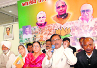 Former MP Satya Pal Jain address a press conference in Chandigarh.