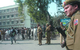 Cops keep vigil outside the Tis Hazari court in New Delhi on Thursday following a hoax terror call.