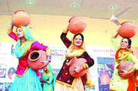 Students of Khalsa College for Education perform giddha during Amritsar multicultural festival.