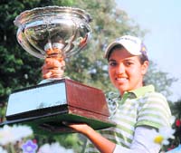 Gauri Monga with the Punjab Open Trophy at the Chandigarh Golf Club on Friday. 