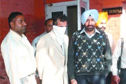 Vigilance officials arrest Rakesh Chander Suri, a house tax inspector, in Jalandhar