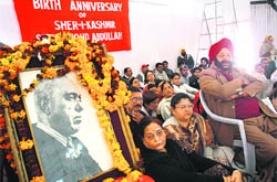 NC leaders celebrate the 103rd birth anniversary of Sheikh Abdullah at the party office in Jammu on Friday.