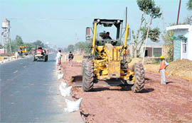 Work in progress on four-laning of Ludhiana-Malerkotla road.