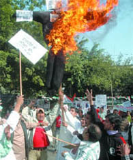 Nationalist Youth Congress activists burn an effigy symbolising terrorism.