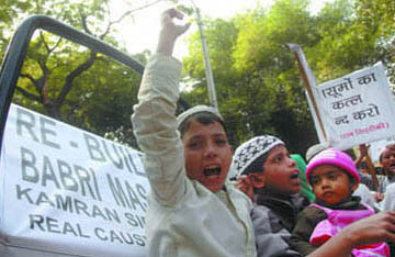 Muslim children protest on the 16th anniversary of the razing of Babri Masjid in Ayodhya, at Jantar Mantar in New Delhi on Saturday.