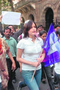 Bollywood actress Diya Mirza takes part in a rally, demanding reforms in the political system and governance, in Mumbai