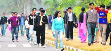 Candidates come out after appearing in the Management Aptitude Test (MAT) in Panjab University 