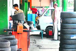 A part of the corridor that has been dug up for wheel balancing in a booth of Sector 38 motor market in Chandigarh
