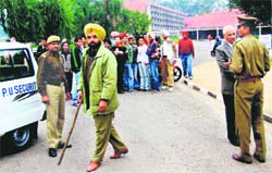 Policemen on the Panjab University campus after a bomb scare