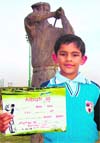 Aadil Bedi poses with his certificate at the CGA Golf Range, Chandigarh