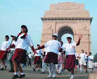 Schoolchildren participate in a Human Rights Race to commemorate the 60th anniversary of the Universal Declaration of Human Rights at the India Gate in New Delhi on Sunday. 
