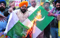 National Akali Dal activists protest against the Mumbai terror attacks at Jantar Mantar in New Delhi on Sunday. 