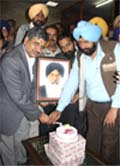 BMC Mayor (right) and SAD area in-charge cutting a cake to celebrate CMs Bday in Bathinda