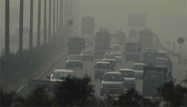 Fog engulfs the Delhi-Jaipur highway in Gurgaon on Monday afternoon.
