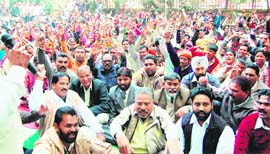 The Punjab State Municipal Karamchari Dal holds a rally in Ludhiana. 