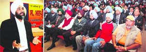 Finance minister Manpreet Badal addresses coaches of the Punjab Sports Department during a seminar at the PAU in Ludhiana on Monday.