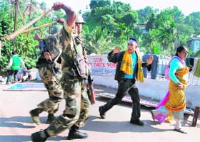 CRPF jawans resort to lathi charge to disperse activists of the All Koch Rajbangsi Student's Union (AKRSU), demanding a separate Kamtapur state, during a protest rally, in Guwahati