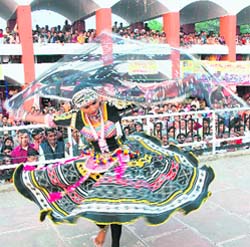 An artiste from Rajasthan gives a performance on the concluding day of the Gita Jayanti Samaroh in Kurukshetra