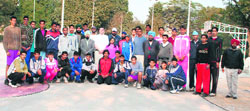 David John Petroziello, who has been invited to train Punjab cagers for the forthcoming national championship, poses with association members.