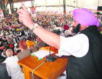 Capt Amarinder Singh addresses a Congress workers meeting at Faridkot on Tuesday. 
