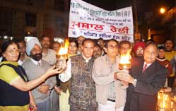 Members of the Human Rights Protection Forum organised a torch procession in Bathinda to mark the International Human Rights Day