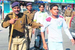 A Shiv Sena worker arrested during the bandh 
