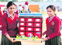 Students from a Hoshiarpur school with their model at the state-level science exihibition at Punjab Agriculture University in Ludhiana 