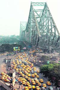 Taxis stranded near Howrah Bridge after private bus owners went on a strike called by CITU-led unions against harassment of bus drivers in Kolkata
