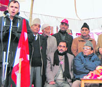 NC president Omar Abdullah (left) addresses an election rally at Pulwama in south Kashmir on Thursday.