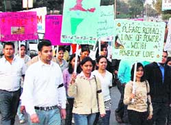 Students of the University Business School during a peace march against Mumbai terror in Ludhiana