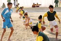 A Kho-Kho match in progress during the Punjab State Primary School Games at the sports stadium in Bathinda