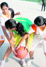 Players of St Xavier's School-44 and New Public School, Sector 18, in action during the Inter-School Basketball Championship on Friday in Chandigarh.