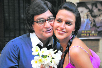Vinay Pathak with Neha Dhupia in his latest release Dasvidaniya. His big break came with Sagar Ballarys Bheja Fry.