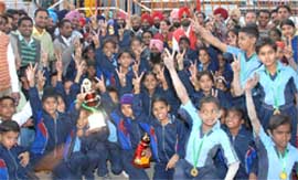 Bathinda team posing for the photograph after winning the overall trophy at the Punjab State Primary School Games in Bathinda