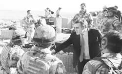 Britains Prime Minister Gordon Brown speaks to soldiers from the Royal Gurkha Rifles regiment at Roshan Tower during a visit to Musa Qala district of Helmand Province, Afghanistan,