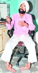Billa Lasoi Wala, a physically-challenged Dalit youth, who has been running from pillar to post for getting a case registered.