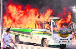 Mob set this bus on fire after it crushed a child in Bathinda on Sunday. 