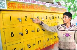 A caretaker of the cremation ground in Bathinda shows rusted locks of the lockers where ashes of the departed have been lying from the past many years. 