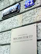 The name of Swiss bank Reichmuth & Co is seen on a plate beside the entrance of its Zurich office