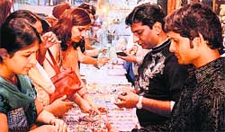 Women make purchases at a store in Ludhiana.