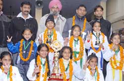 Medal winners of the 7th Punjab State Sub-junior Tae Kwon Do championship 2008, flash victory signs in Bathinda