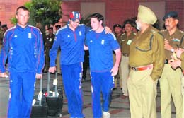 Members of the England cricket team being escorted by security personnel at the Taj Hotel lobby in Chandigarh on Tuesday.