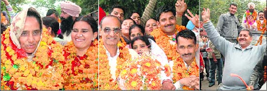 Victorious candidates in the panchayat election from Dhanas, Kishangarh and Khuda Lahora villages outside the counting centre in Chandigarh on Tuesday.