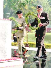 War veterans pay homage at the Veer Smriti War Memorial in Chandimandir on the occasion of Vijay Diwas on Tuesday. 
